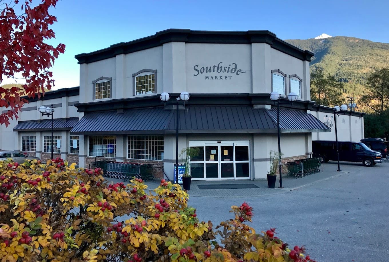 grocery storefront with mountain background