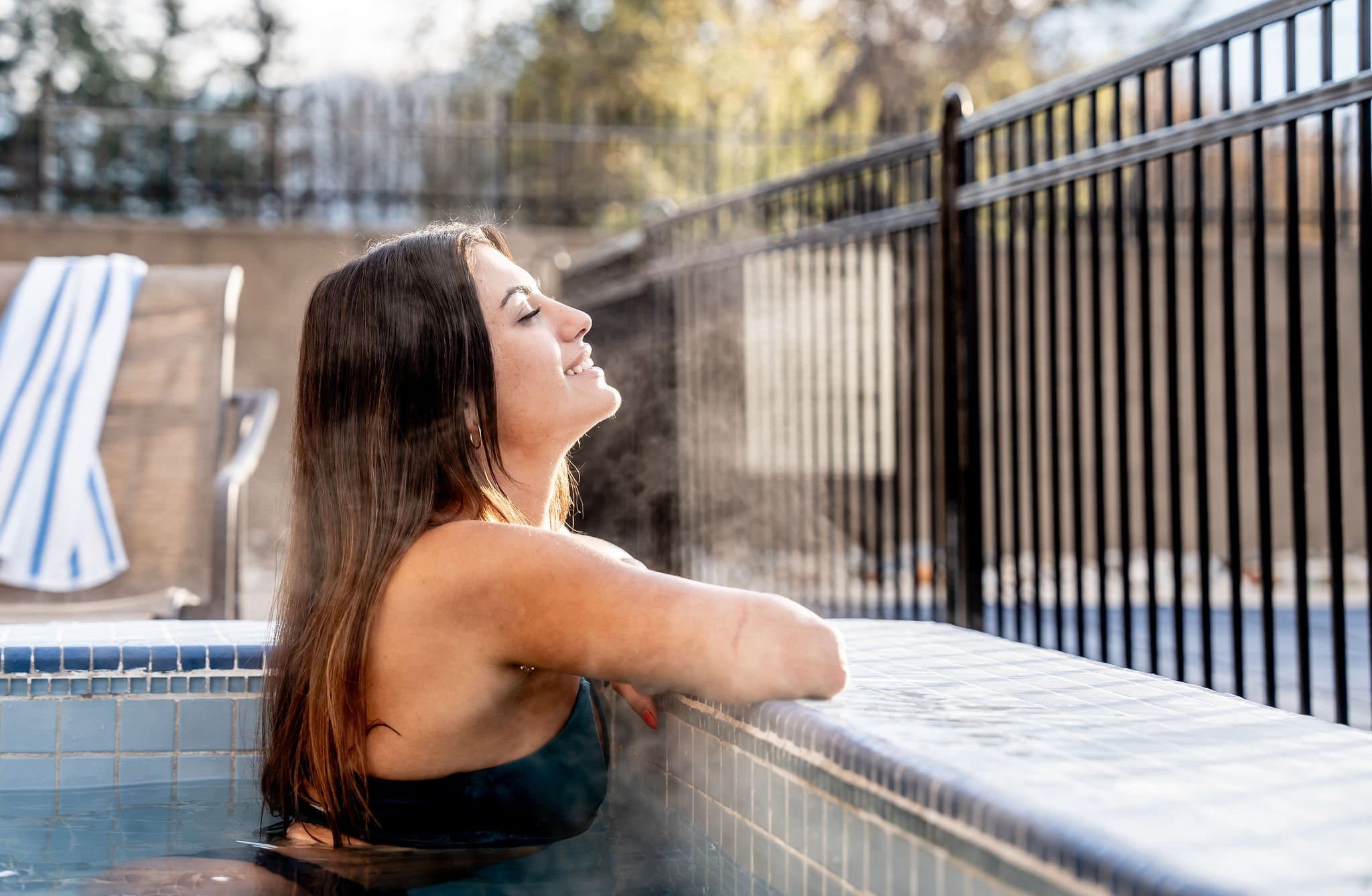 girl in hot tub outdoors after massage treatment