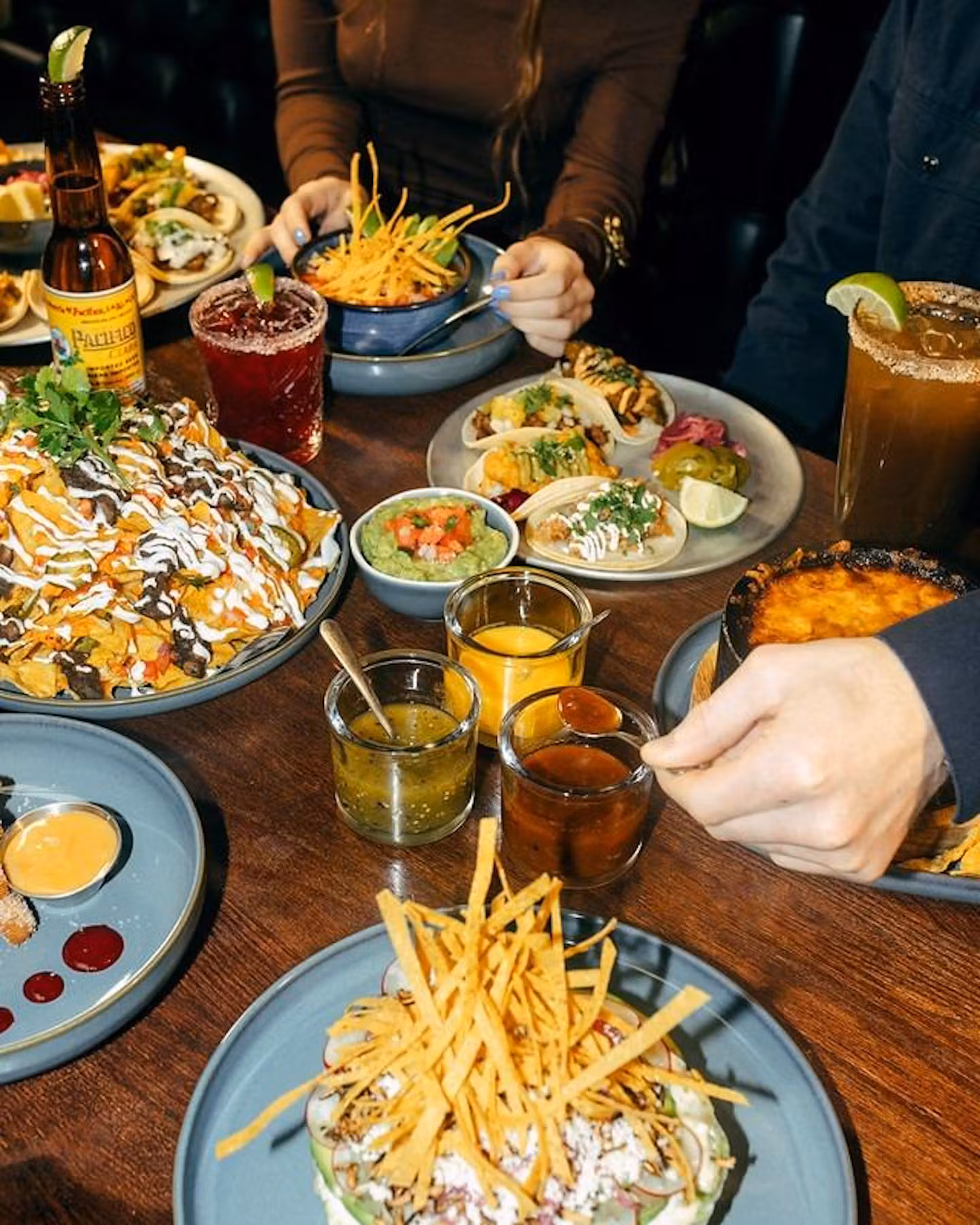 table full of Mexican cuisine