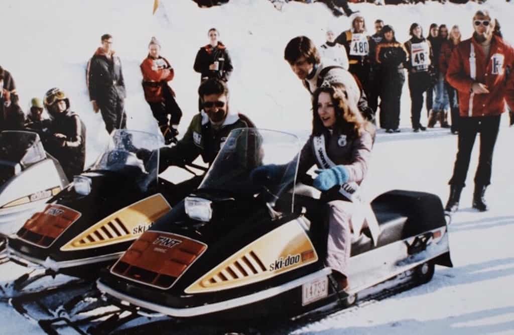woman on snowmobile in 1970s