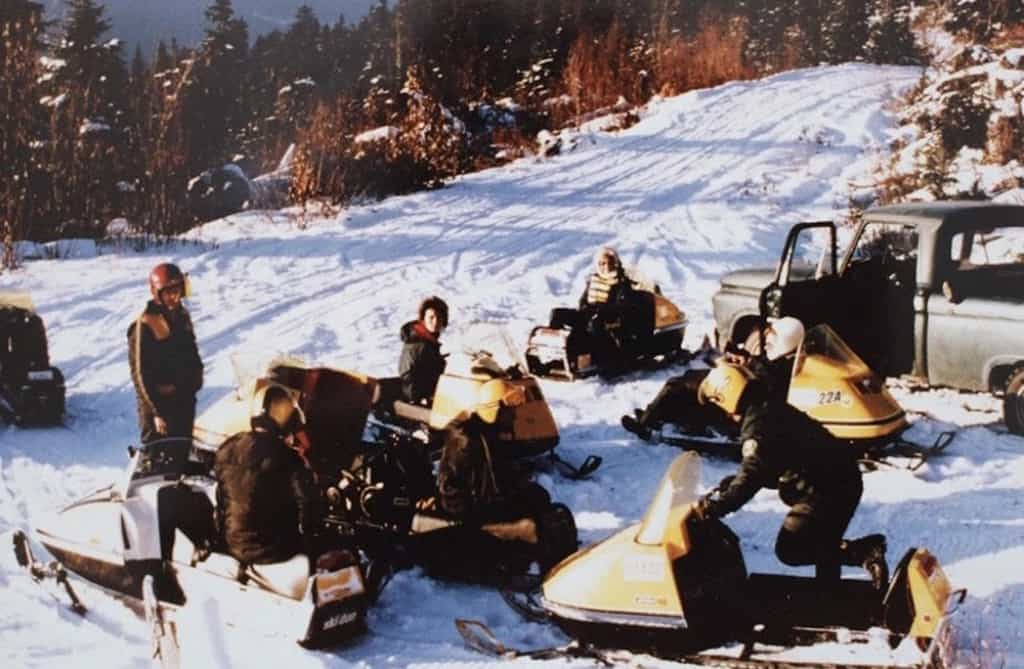 archive image of snowmobilers
