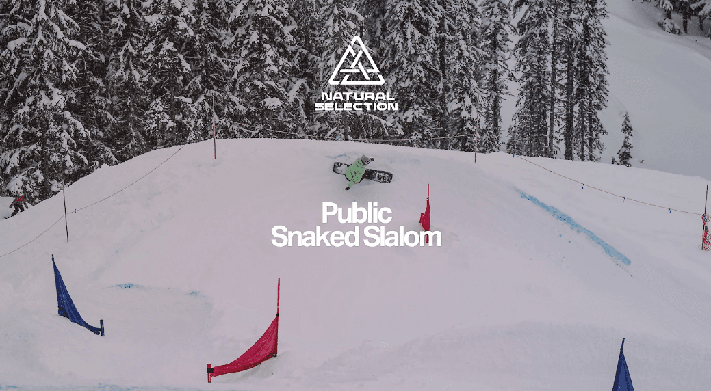 Snowboarder gliding down a snowy slalom course with red and blue gates, surrounded by snow-covered trees. Event logo and text overlay.