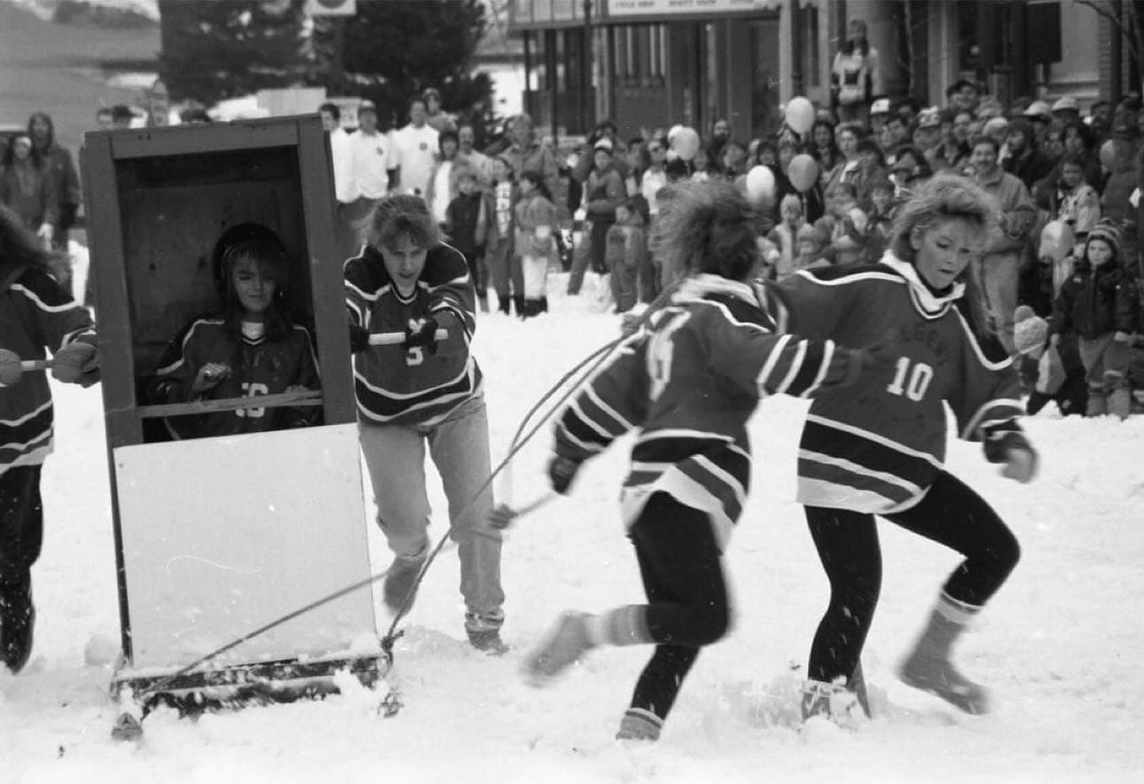 outhouse races through streets of downtown