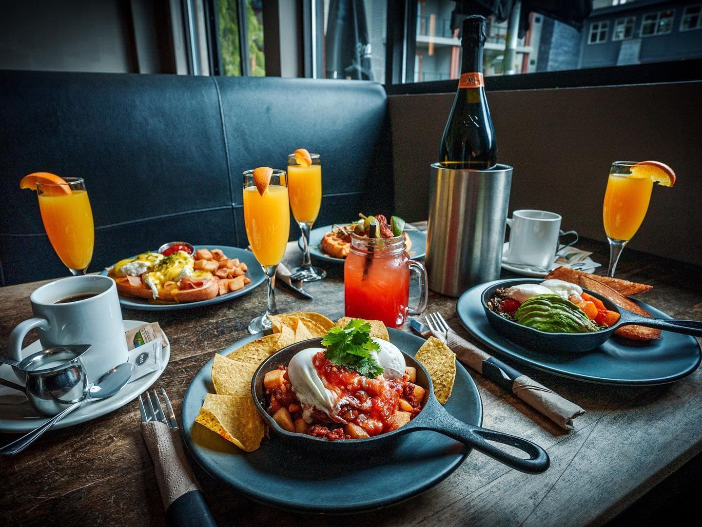 breakfast set on table with mimosas