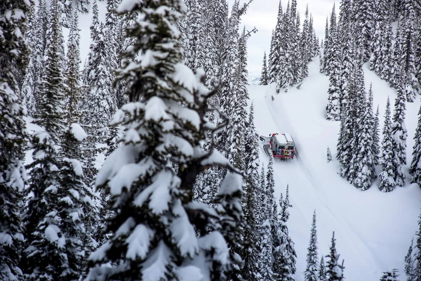 snow cat going up cat track