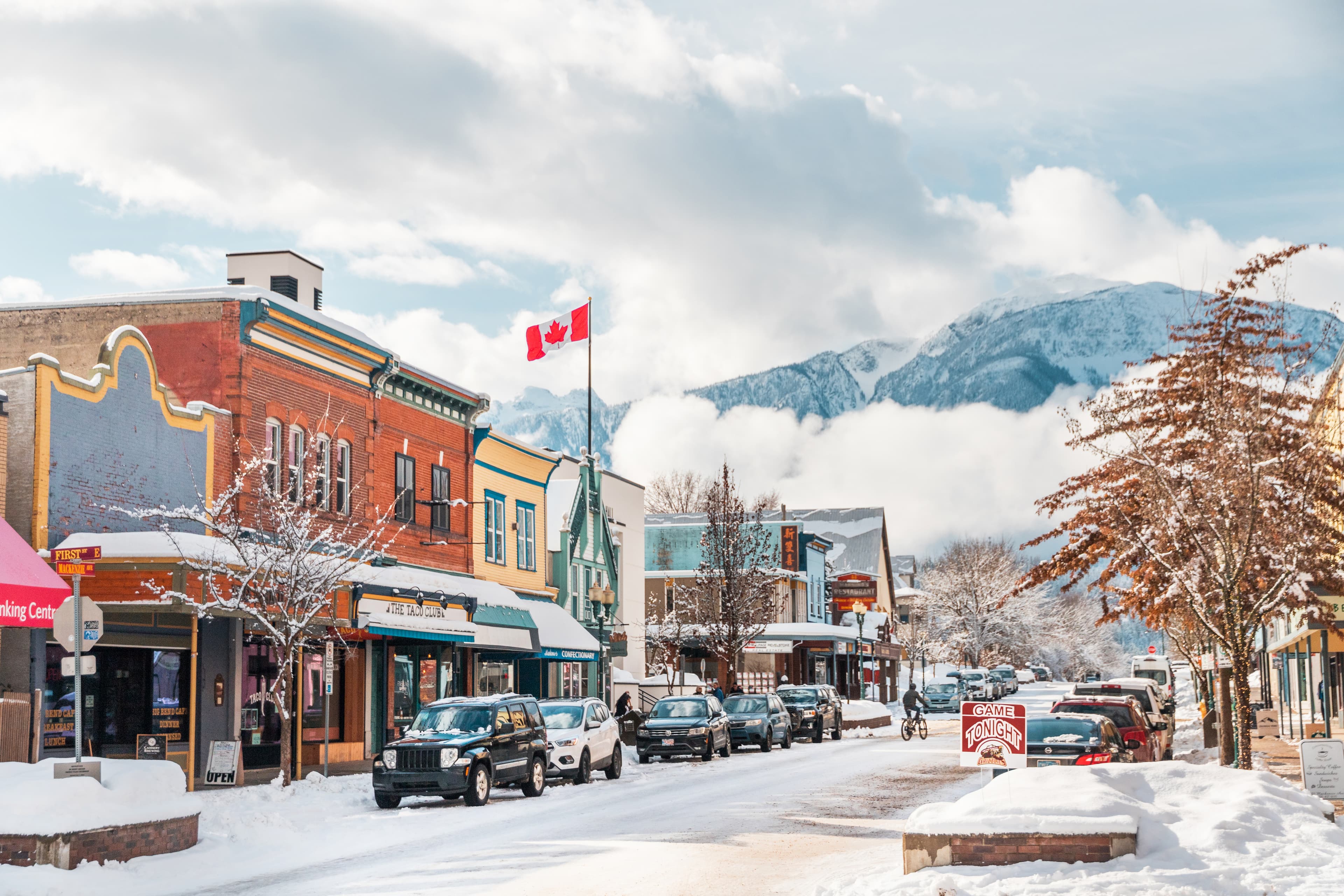 snowy streets of revelstoke on a sunny day
