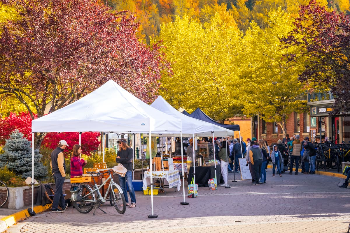 tents set up at fall market in downtown street