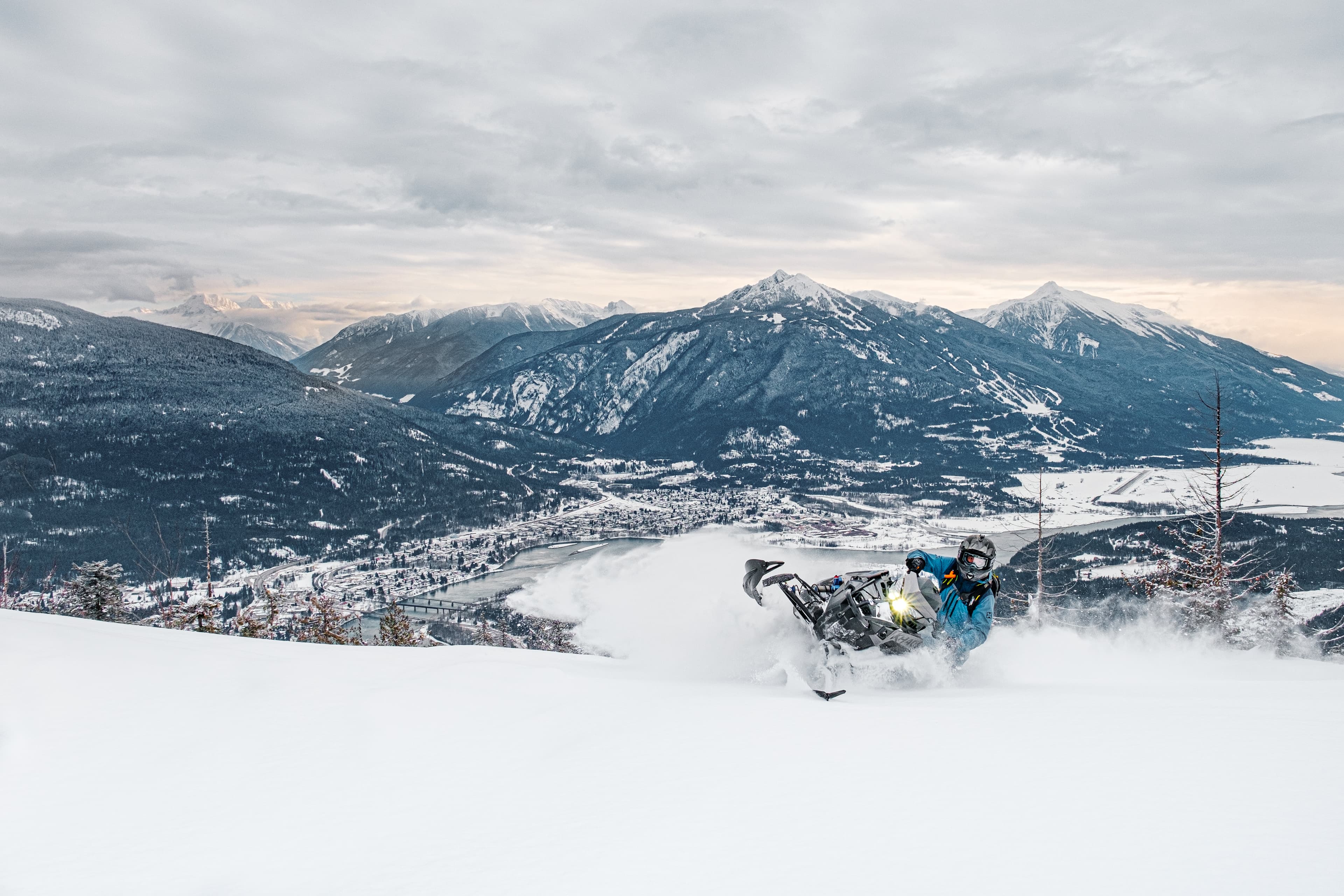 snowmobiling above valley