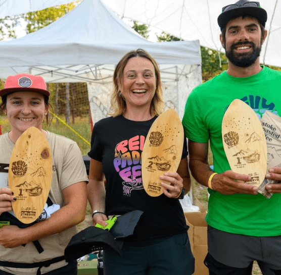 winners of paddle fest holding awards
