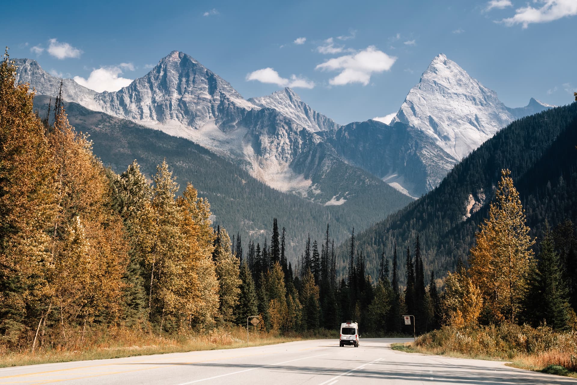 camping van driving through national park