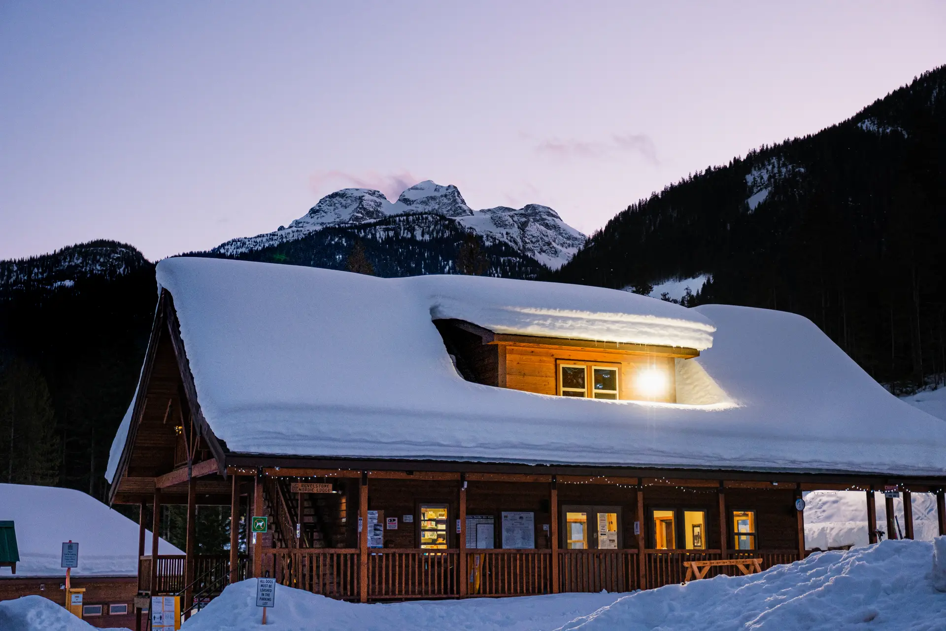pink sunset over mount begbie and mount macpherson lodge