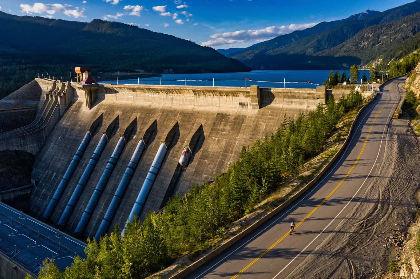 dam-revelstoke-road-bike-summer-lake-revelstoke