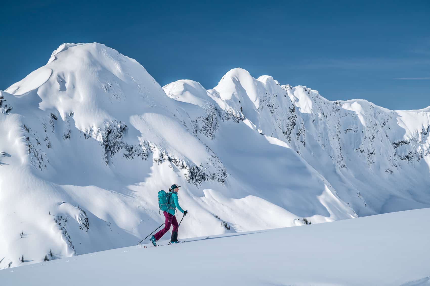 Backcountry Touring Woman ski touring in Rogers Pass