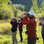 Birders in Revelstoke with binoculars