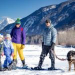 Family snowshoeing in sunny Revelstoke