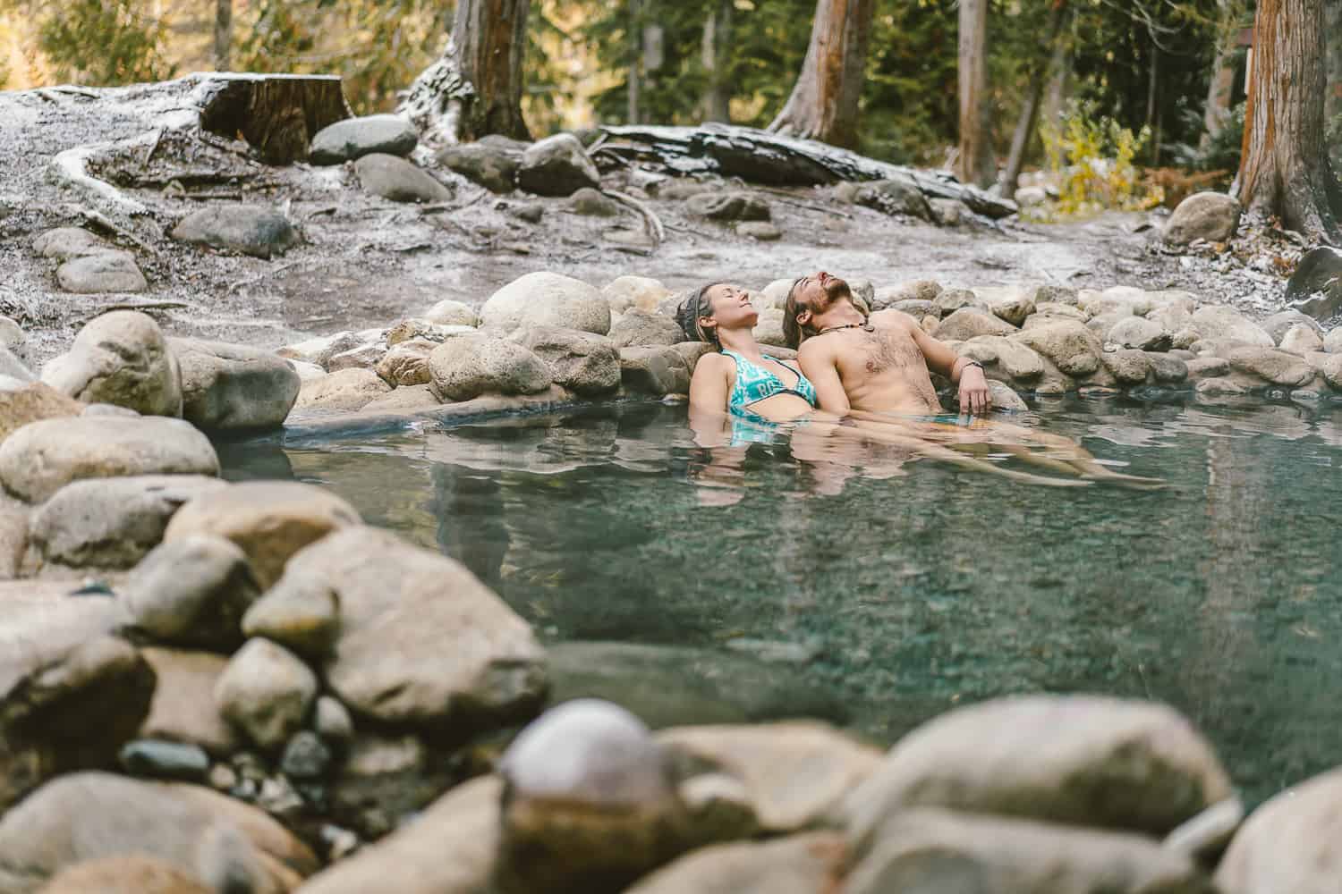 man and woman enjoying Halfway hot springs