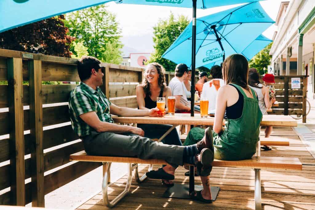 group enjoying drinks on patio