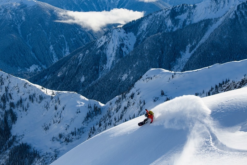 Snowboarder in the Selkirk mountain range