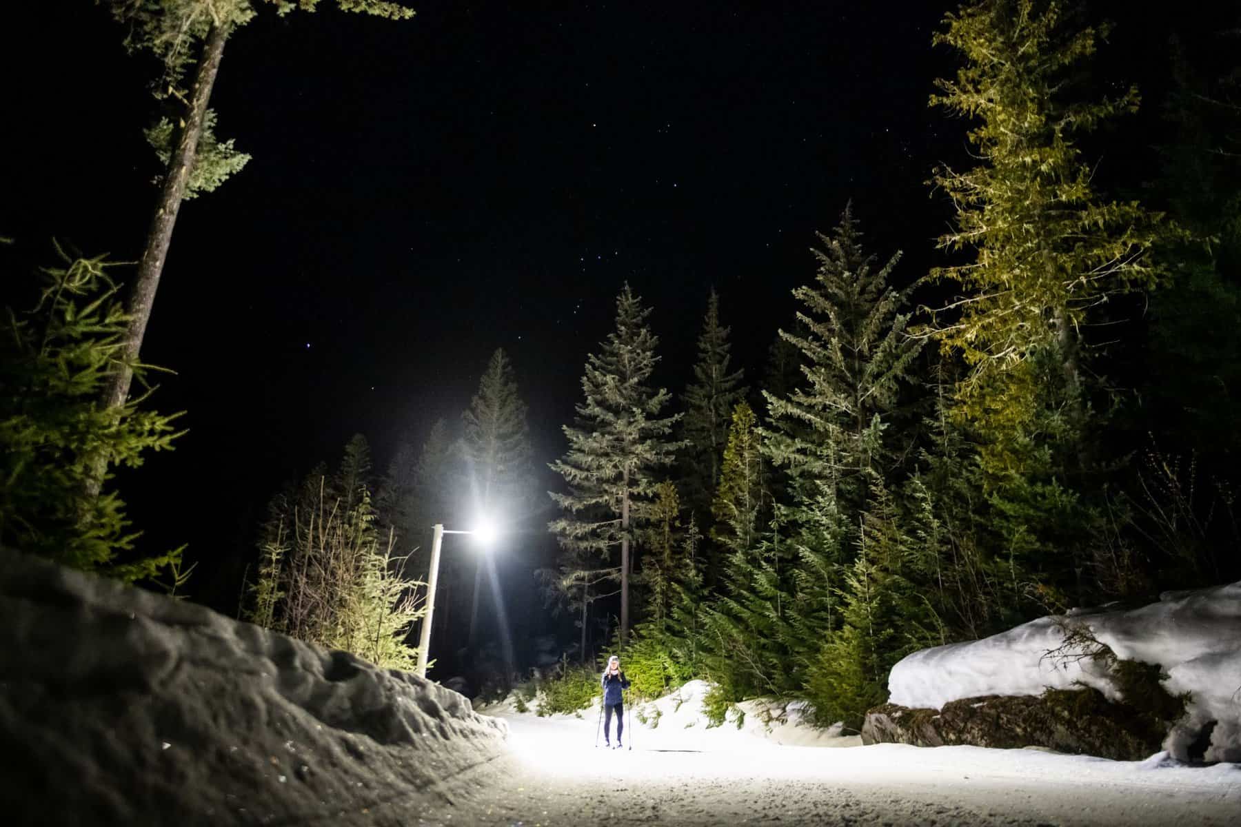night nordic skiing with lit trail