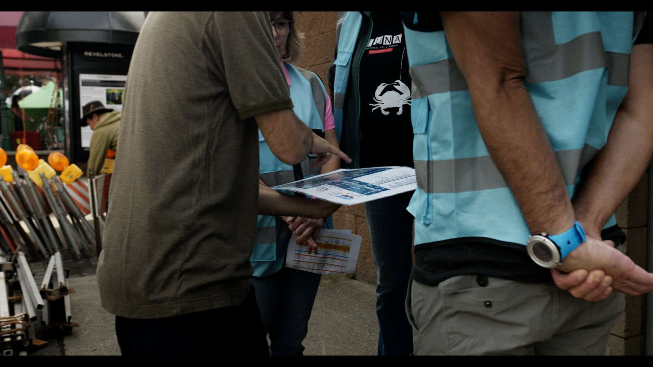 volunteers with a clipboard volunteering